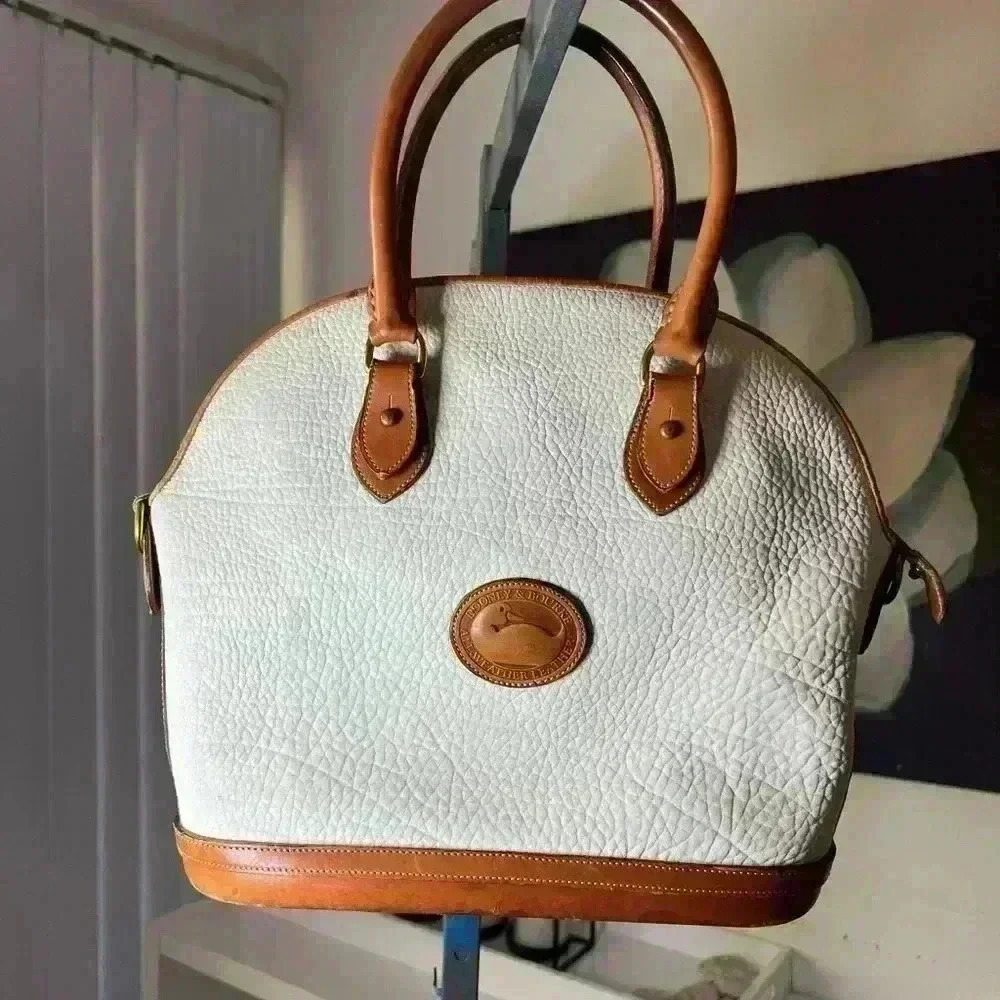 Vintage Dooney and Bourke Bone Norfolk Bag